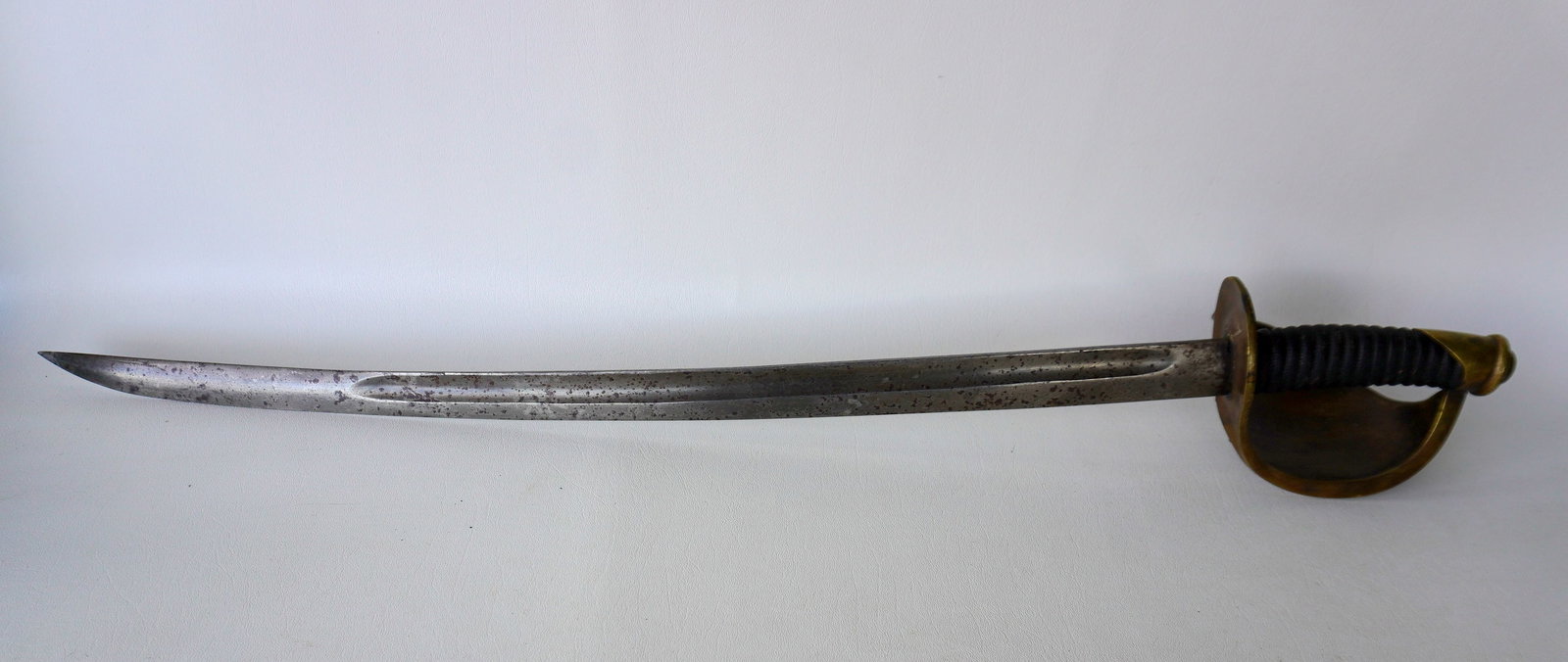 Civil War US Navy Officer's Cutlass, signed "Made by Ames Mfg. Co. / Chicopee / USN DR 1862" - no: Civil War US Navy Officer's Cutlass, signed "Made by Ames Mfg. Co. / Chicopee / USN DR 1862" - no scabbard, but otherwise appears in very good condition. Total size 31 3/4"L x 25 7/8" blade length. Pr