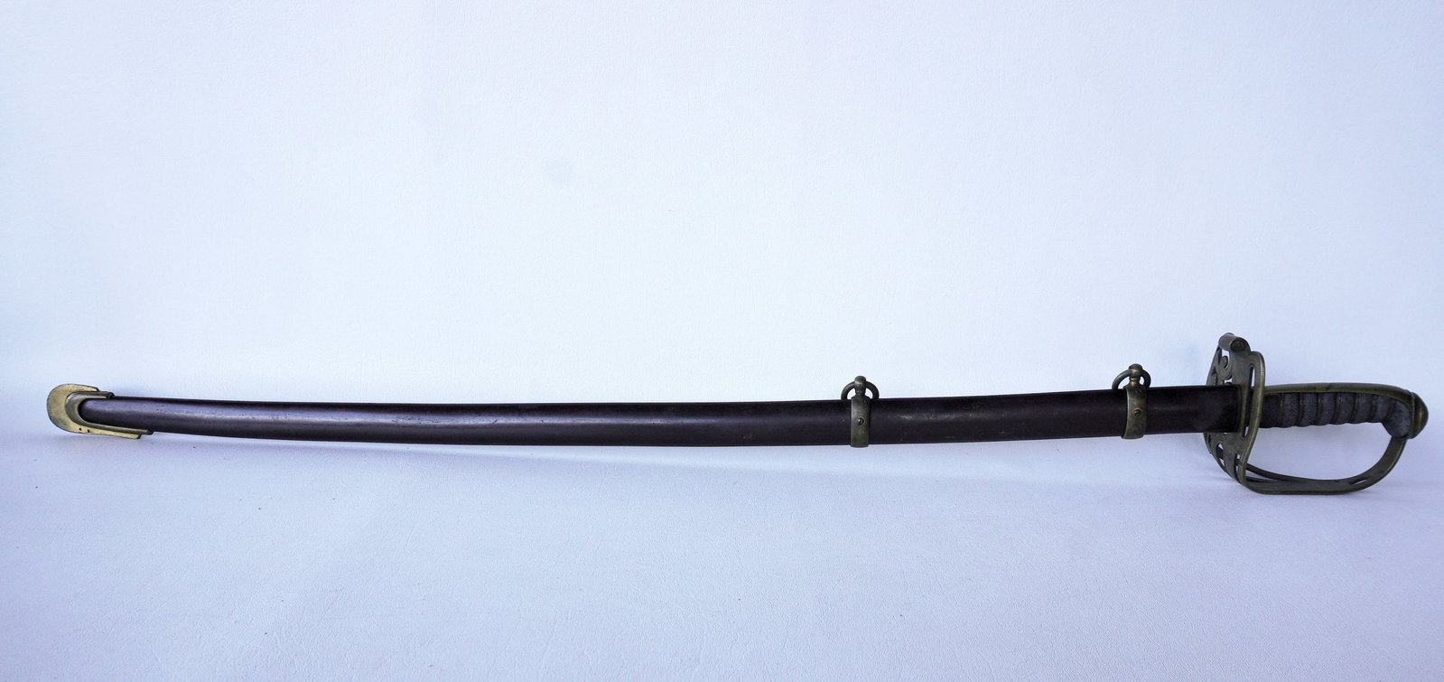 Clauberg Civil War US Officer's sword with scabbard, marked "W. Clauberg / Solingen" and also: Clauberg Civil War US Officer's sword with scabbard, marked "W. Clauberg / Solingen" and also impressed on the reverse side "PROVED" within small circle - the grip in sharkskin and the pierced hand gu