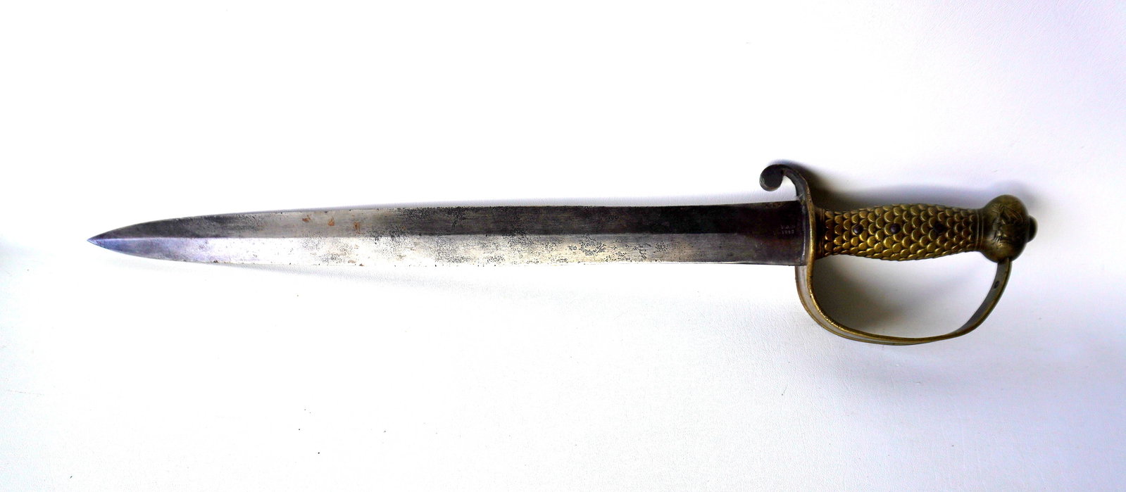 US Navy Model 1842 short sword marked "N.P. Ames / Cabotville Mass./ U.S.N. 1842" having a double: US Navy Model 1842 short sword marked "N.P. Ames / Cabotville Mass./ U.S.N. 1842" having a double edge blade, brass hand guard, pommel decorated with 2 embossed spread wing eagles and fish scale patte