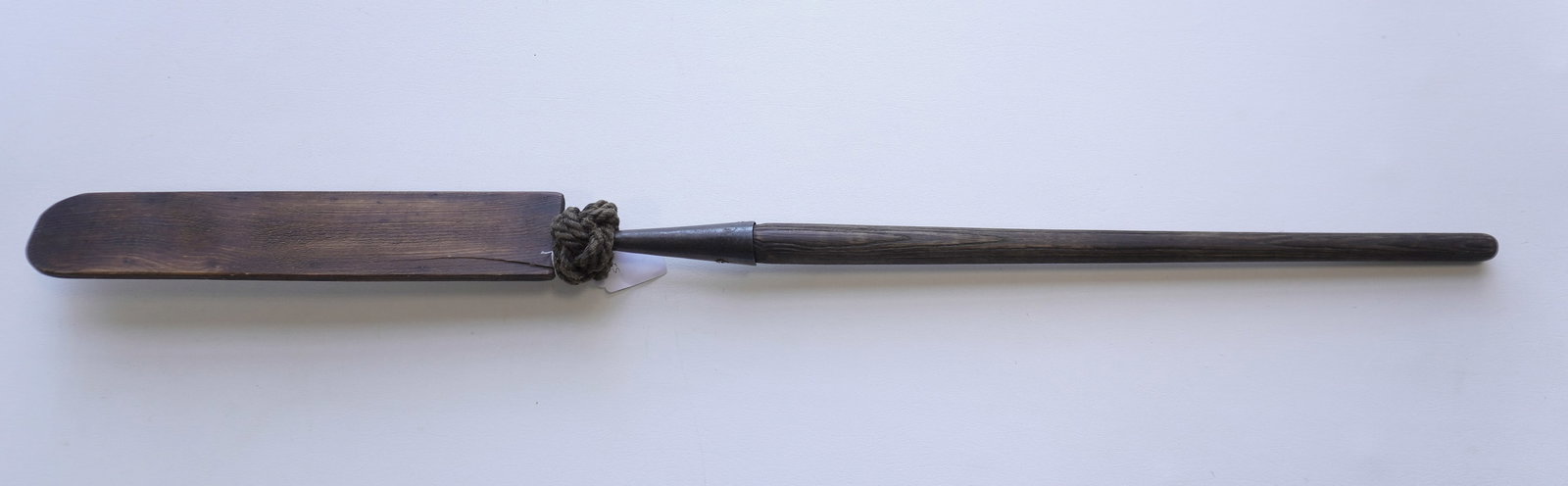 An iron lance, with wooden sleeve that covers the blade, probably late 19th century. Good condition.: An iron lance, with wooden sleeve that covers the blade, probably late 19th century. Good condition. Measures 52"L with wooden cover attached. Note the braided sailor made knot at base of blade. Prove