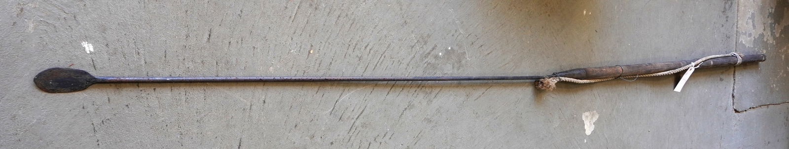 A long 19th century whaling killing lance, all hand forged iron attached to old, but not original,: A long 19th century whaling killing lance, all hand forged iron attached to old, but not original, wooden handle. Good condition. Measures 131"L. Provenance: From the estate of Jeff Raymond, Red Hook