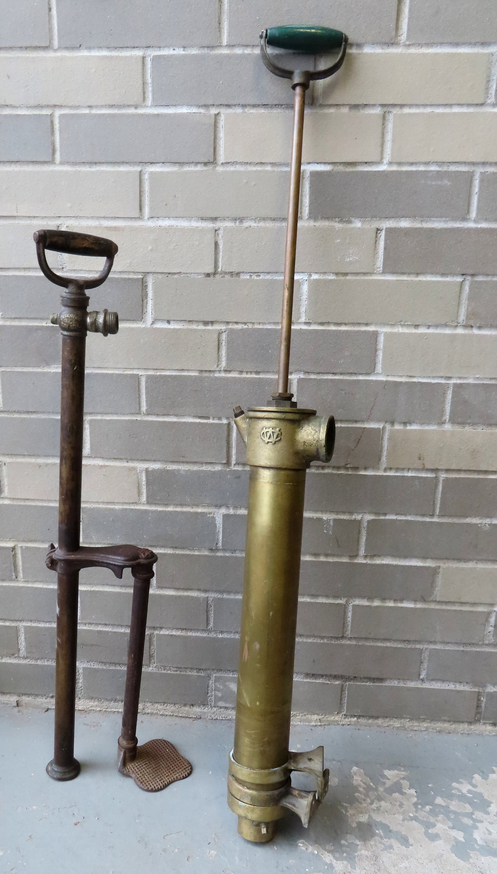 Two brass bilge pumps that appear to be in working order.: Two brass bilge pumps that appear to be in working order but have not been tested. One signed illegibly and one with monogram with patent date 1877 - see photos for more details. The largest measures 