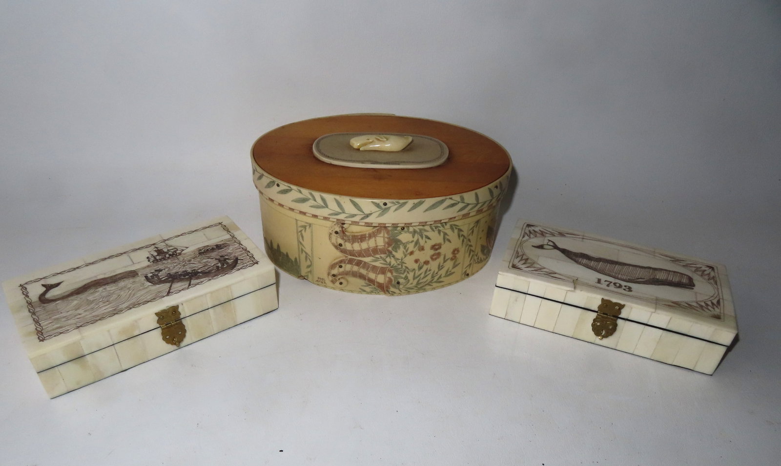 Three reproduction scrimshawed boxes including: Resin ditty box with carved whale applied to lid -: Three reproduction scrimshawed boxes including: Resin ditty box with carved whale applied to lid - loss to whale, otherwise good condition - 6"W x 8"L x 3 1/2"H; 2 dresser boxes, possibly mother of pe