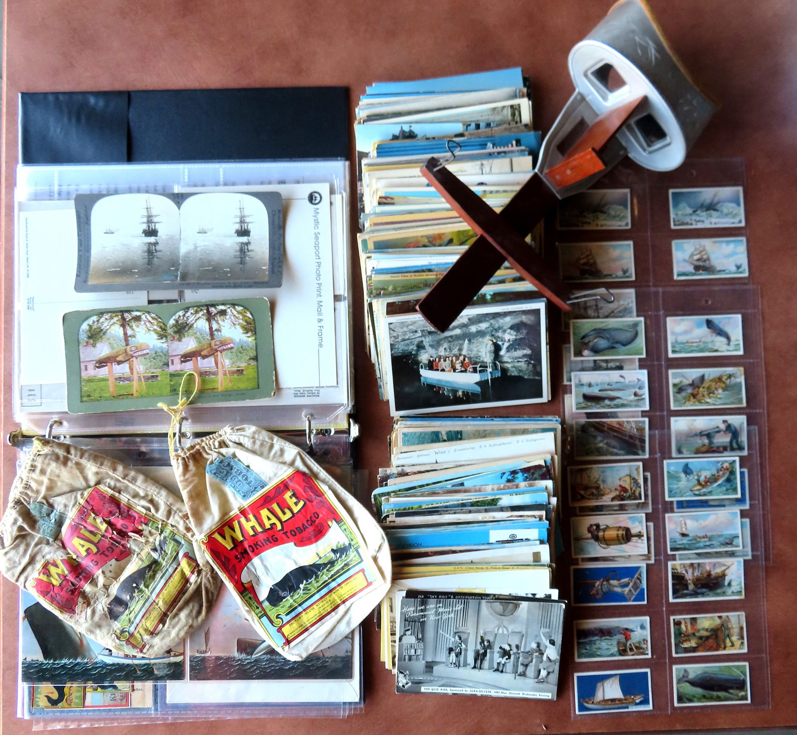 A large grouping of ephemera including approximately 320 postcards, most 1950-60 but some earlier,: A large grouping of ephemera including approximately 320 postcards, most 1950-60 but some earlier, some nautical related; several Soapine advertising cards; 2 stereoview cards and viewer - one of a Wh