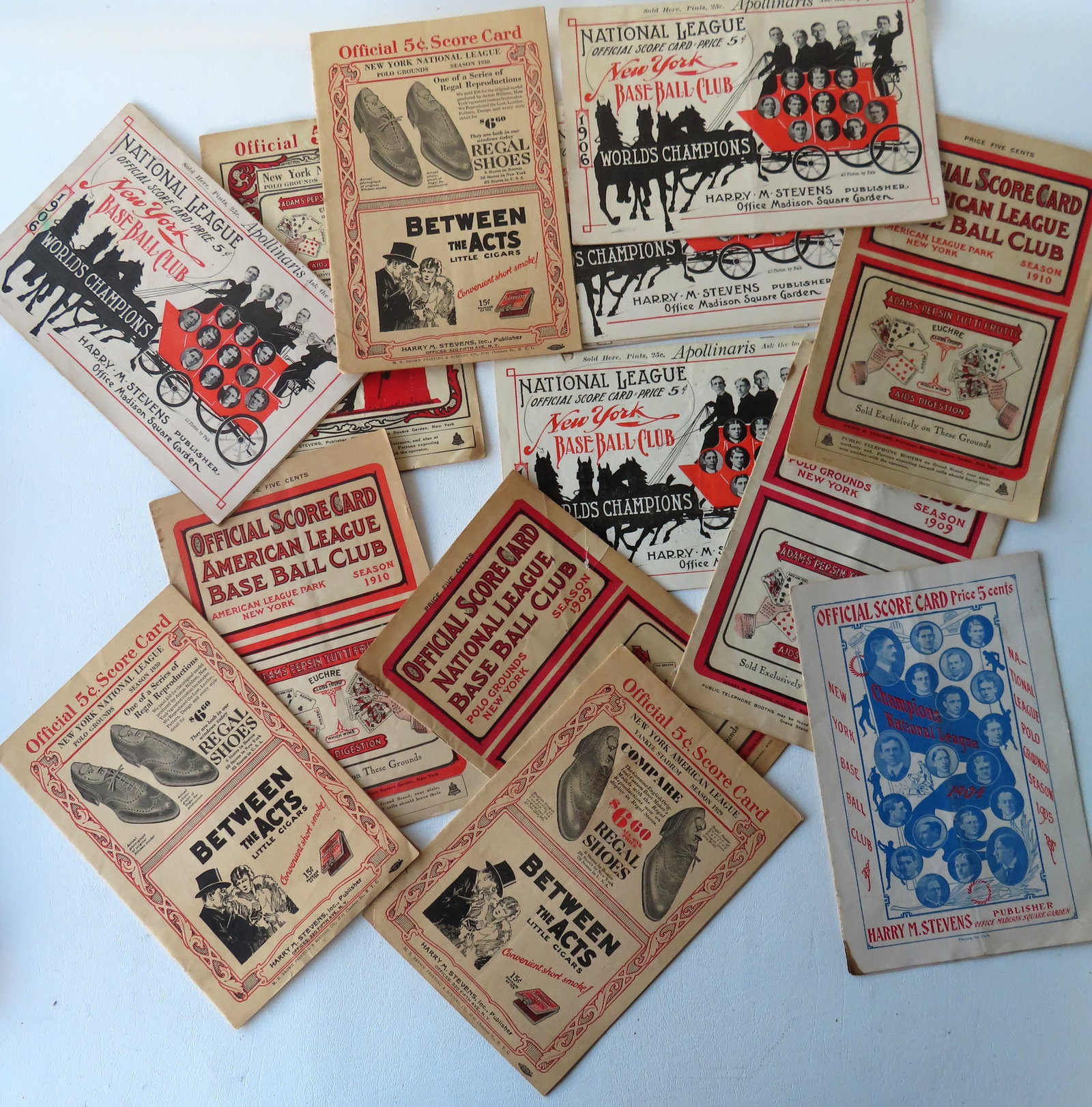 Grouping of 13 early 20th century NY Giants and NY Yankees baseball programs with scorecards: Grouping of 13 early 20th century NY Giants and NY Yankees baseball programs with scorecards including: NY Giants at Polo Grounds 1905, three 1906 (1 with loose pages but complete), 1908, two 1909, tw