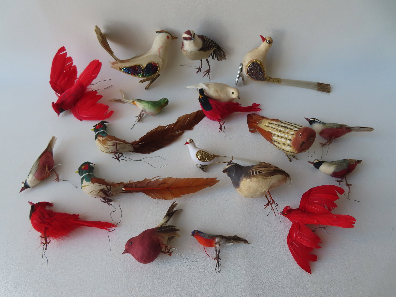 Grouping of 19 feathered and felt Christmas birds, most likely 1960-80 - some signed "Made in: Grouping of 19 feathered and felt Christmas birds, most likely 1960-80 - some signed "Made in Japan". One missing a leg, else all in very good condition.