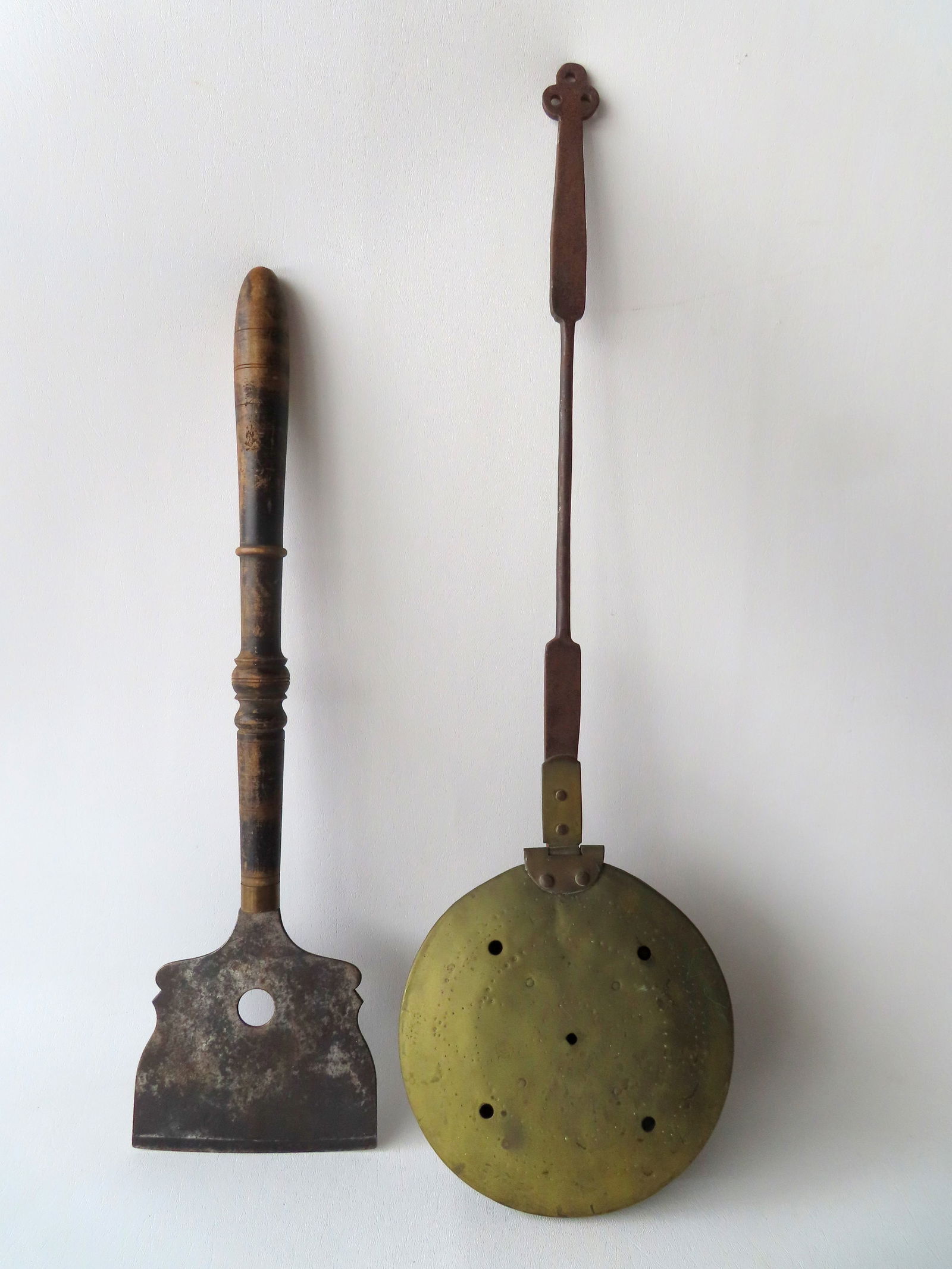 Two early kitchen utensils. The first a hammered copper chestnut roaster with dovetailed base and (1 of 12)