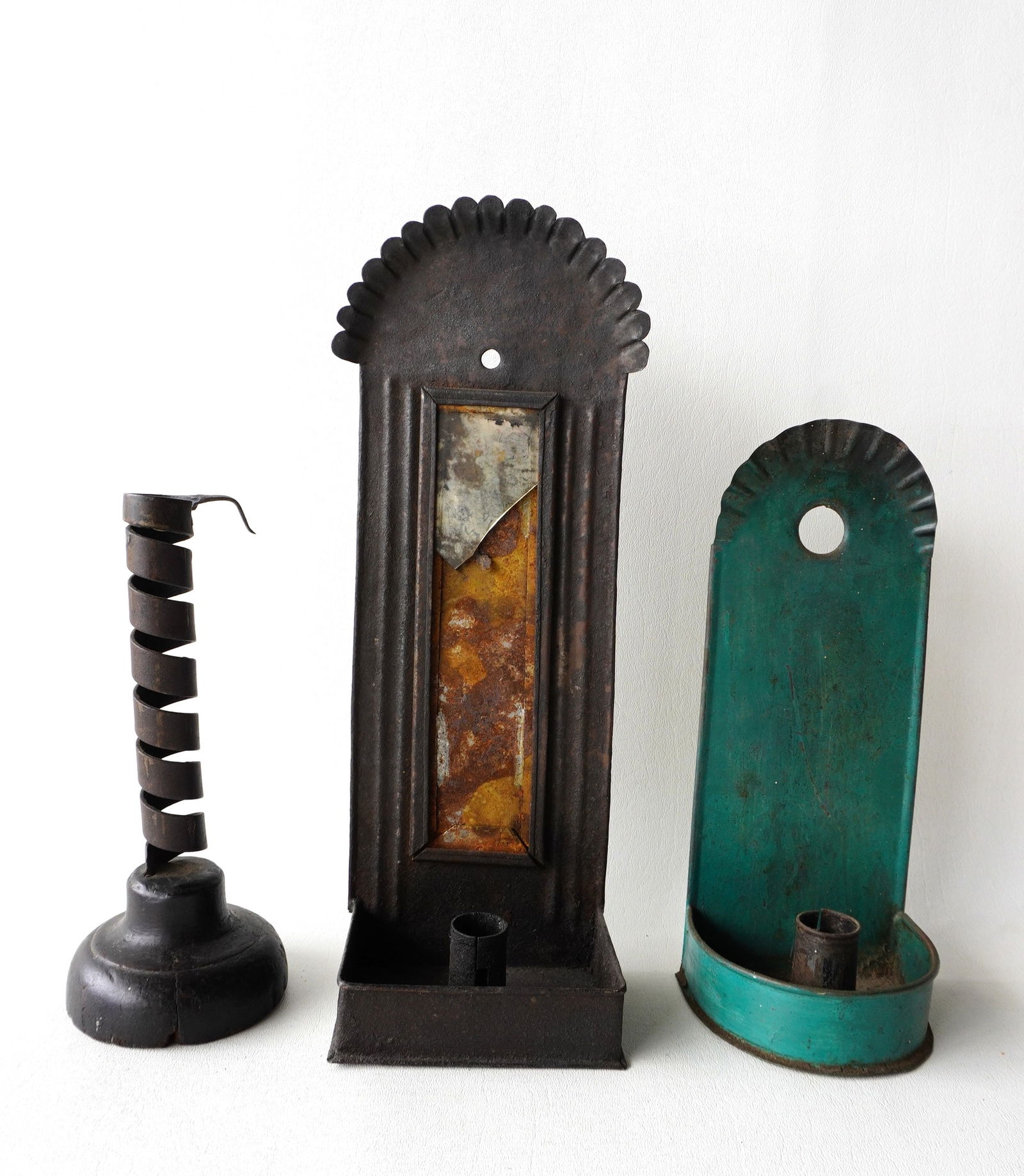 Three early lighting devices including 2 non-matching tin candle wall sconces (the mirror backing on (1 of 12)