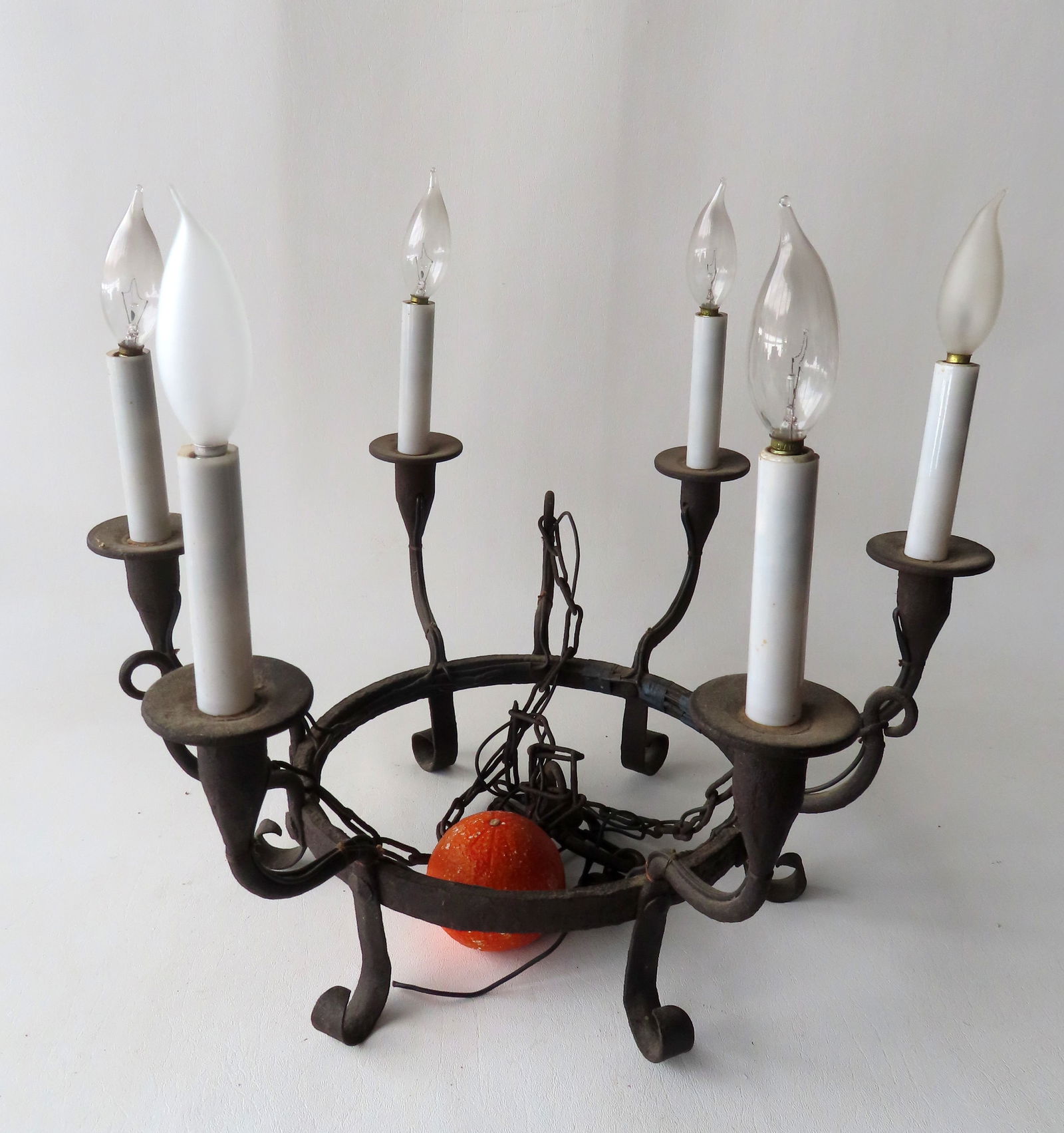 A rare early hand forged iron candle ceiling fixture, 18th century. Electrified so each cup has been (1 of 12)