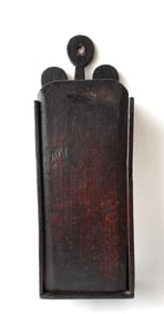 An early wall hanging wooden candle box with lollipop handle and slide lid top in original dark