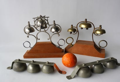 Four carriage bells including 2 mounted on wooden bases, 19th century, all in very good condition.