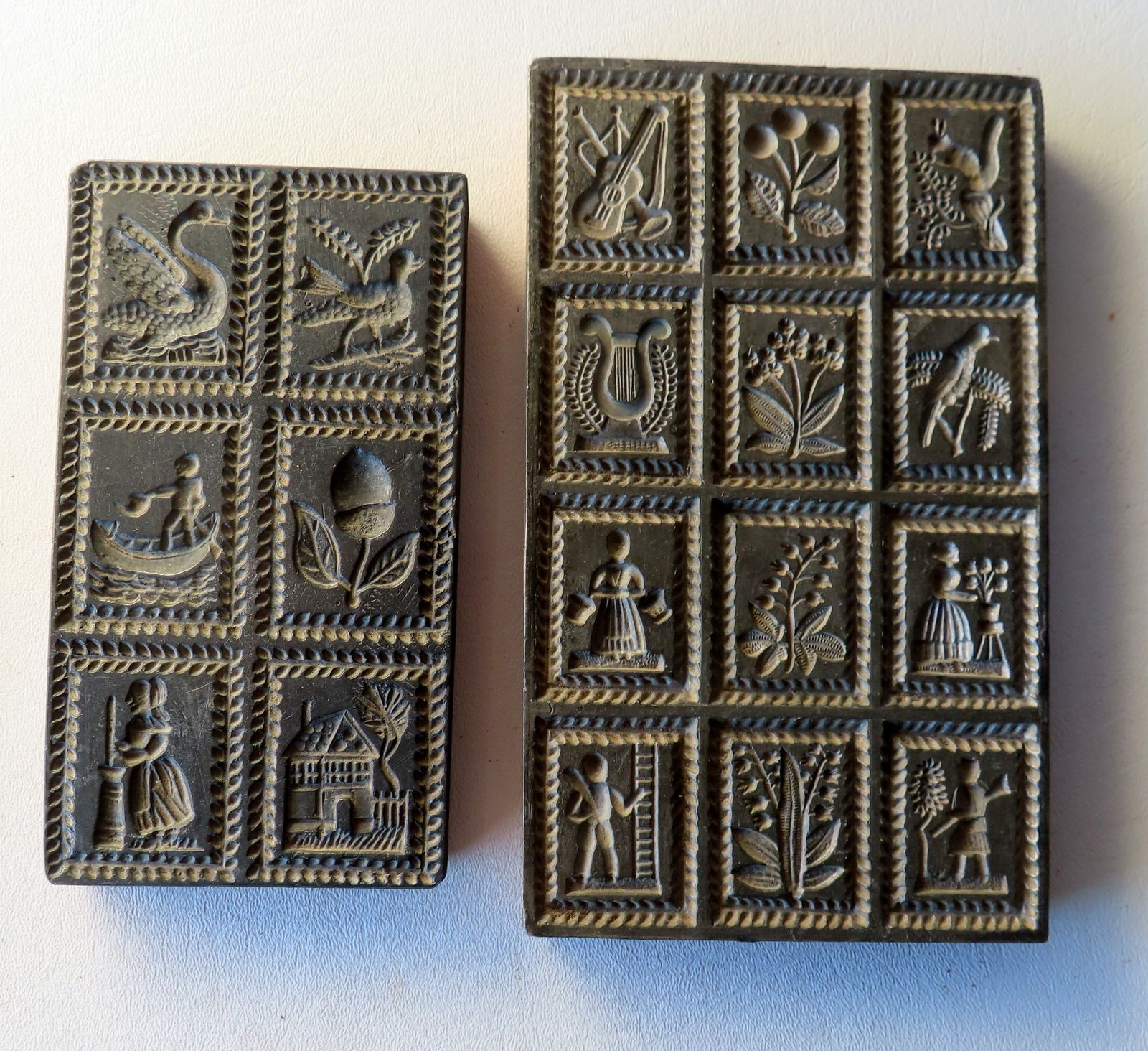 Two pewter on wood candy molds decorated with flowers, birds, figures, etc., signed G. Endress (1 of 6)