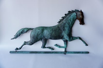 A good swelled body copper running horse weathervane, with cast iron head, and original green