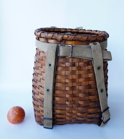 A good child's Adirondack back pack with original canvas harness and crisscrossed woven rim, late