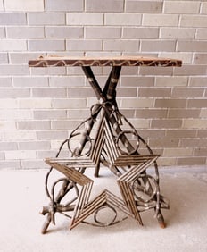 An Adirondack twig stand with original silver painted highlights and having one side decorated with