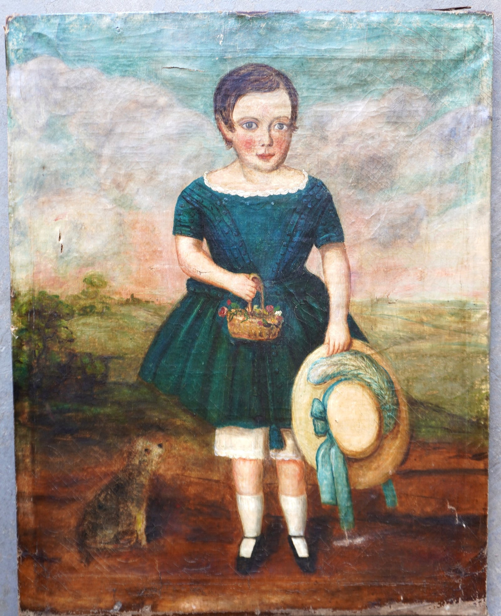 O/C unframed folk art portrait of a young girl holding bonnet in one hand and a basket of flowers in: O/C unframed folk art portrait of a young girl holding bonnet in one hand and a basket of flowers in the other hand - her dog is seated to her right side. Crazing, taped repairs, several small slits i
