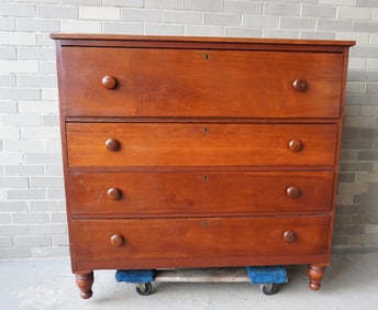 A late Sheraton 4 drawer cherry chest, mounted on turned feet. Very good condition. Measures 46