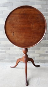 A good country Queen Ann candlestand of excellent proportions, butternut construction, with dish