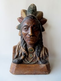 A large counter top composition cigar store Indian bust signed "Artistic Latex Foam Co. Inc. NY",