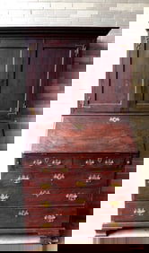 A 2 part Chippendale cherry secretary desk in original darkened finish, circa 1800-1830. The top