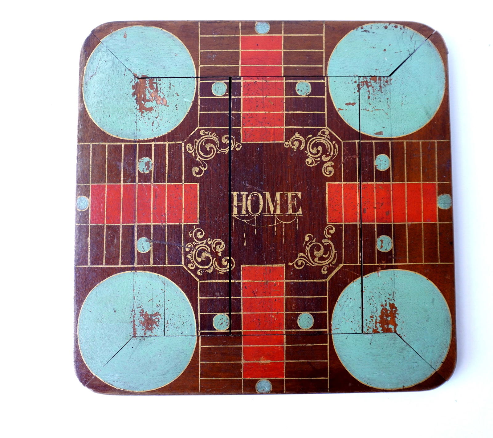 A double side game board, Parcheesi and checkers, circa 1870-80. The Parcheesi board in original (1 of 3)