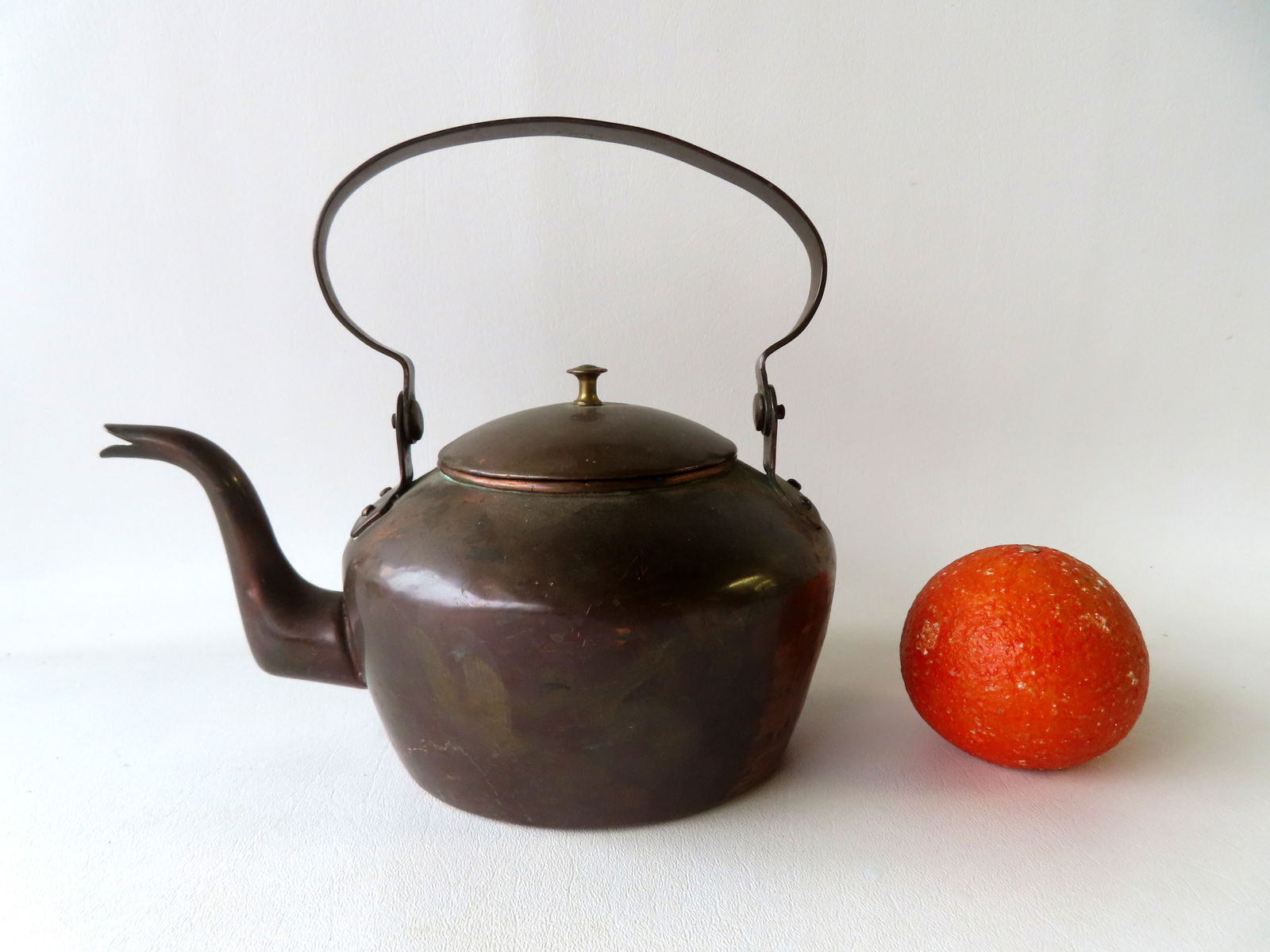 An unusually small copper goose neck tea kettle with swivel handle, dovetailed base and button type (1 of 9)