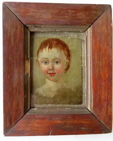 A primitive miniature oil portrait of a child with blue eyes and short red hair, early to mid 19th