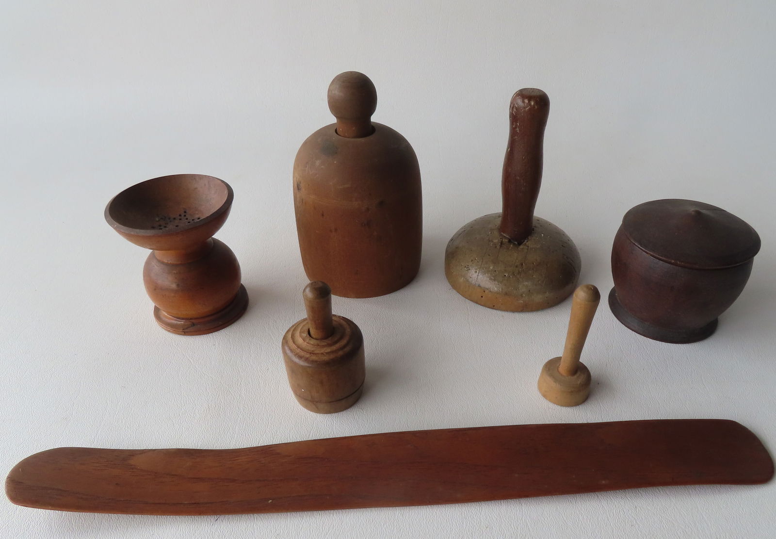 Grouping of 5 redware fruit and vegetable banks in original paint, 19th century. Includes an apple,: Grouping of 5 redware fruit and vegetable banks in original paint, 19th century. Includes an apple, pear, small gourd, yam, and an unknown mustard colored vegetable. All with some paint blemishes, but