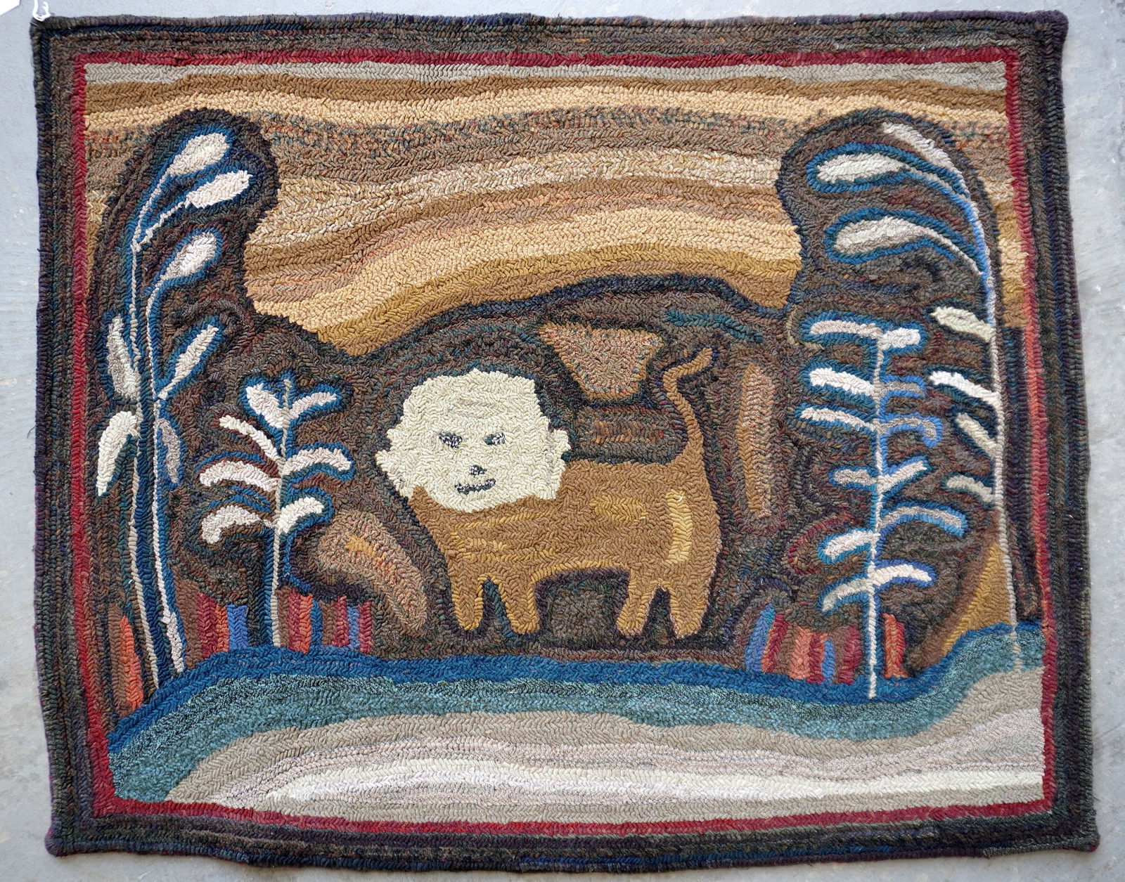 Folk art pictorial hooked rug decorated with a central image of a stylized standing lion flanked by (1 of 5)