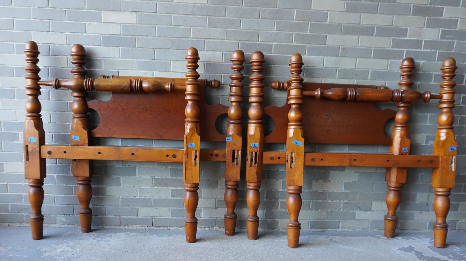 A matched pair of short poster maple rope beds, mid 19th century - both in very good condition. Each (1 of 14)