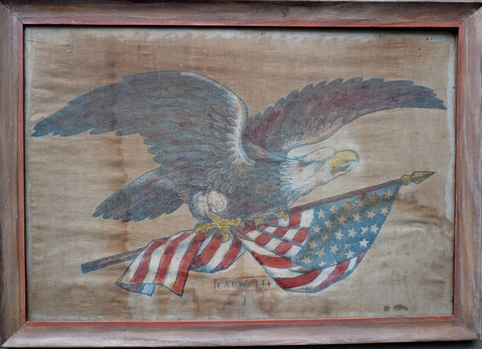 A hand colored Civil War era hand colored print on linen of an eagle holding an American flag in its (1 of 5)