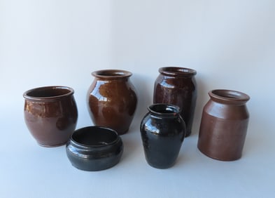 Grouping of 6 redware jars, mid 19th century including the 2 smaller with Albany glaze - both in