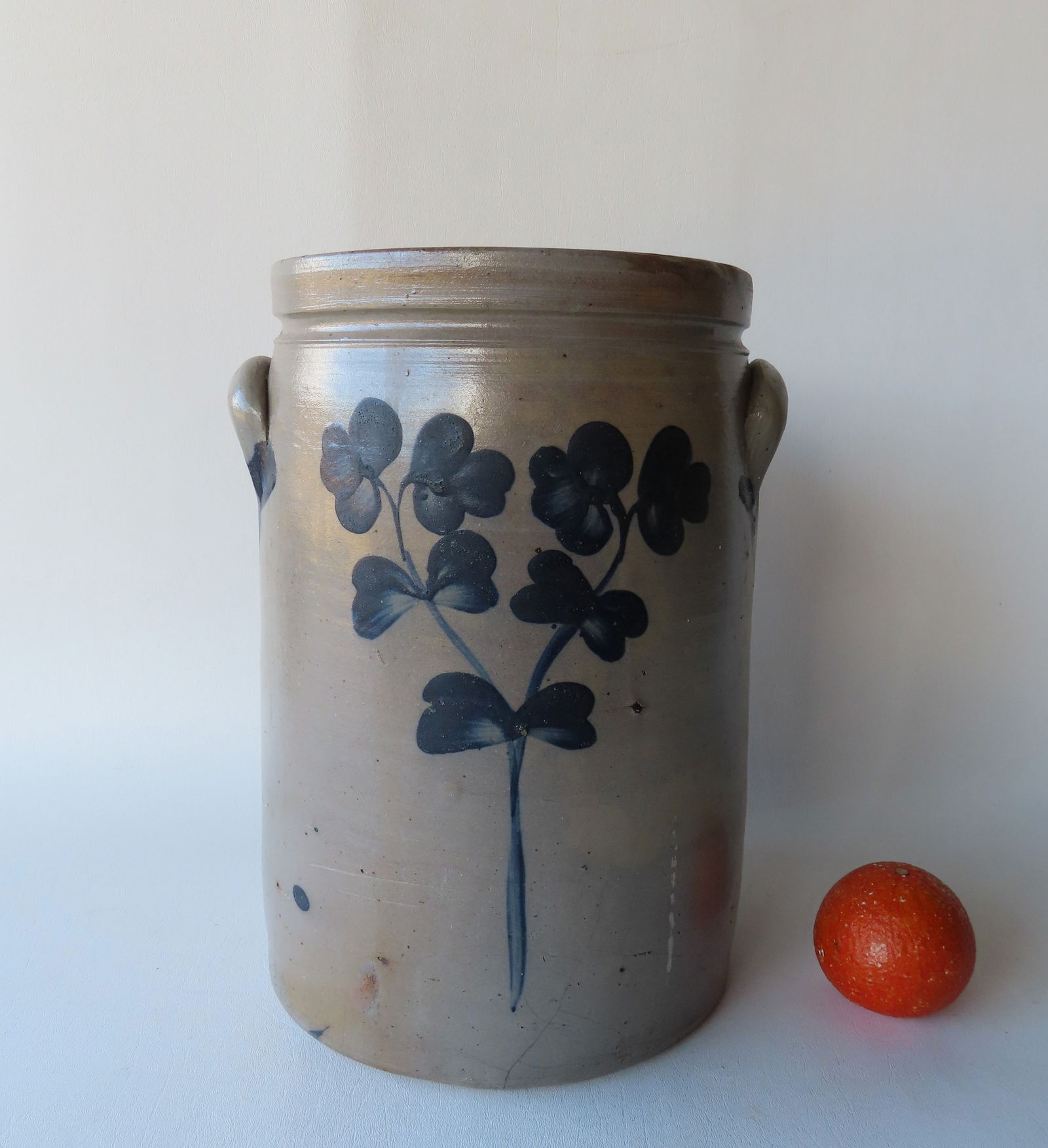 A large stoneware pantry jar decorated with flowers on front and bask side, 3 gallon size, probably (1 of 9)