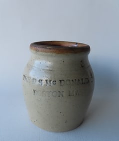A small stoneware oyster jar with the impressed mark of "The D.S. McDonald Co. / Boston Mass. -