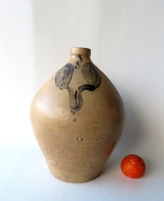 Large stoneware ovoid jug decorated with a cobalt blue flower, 3 gallon size, with tooled handle