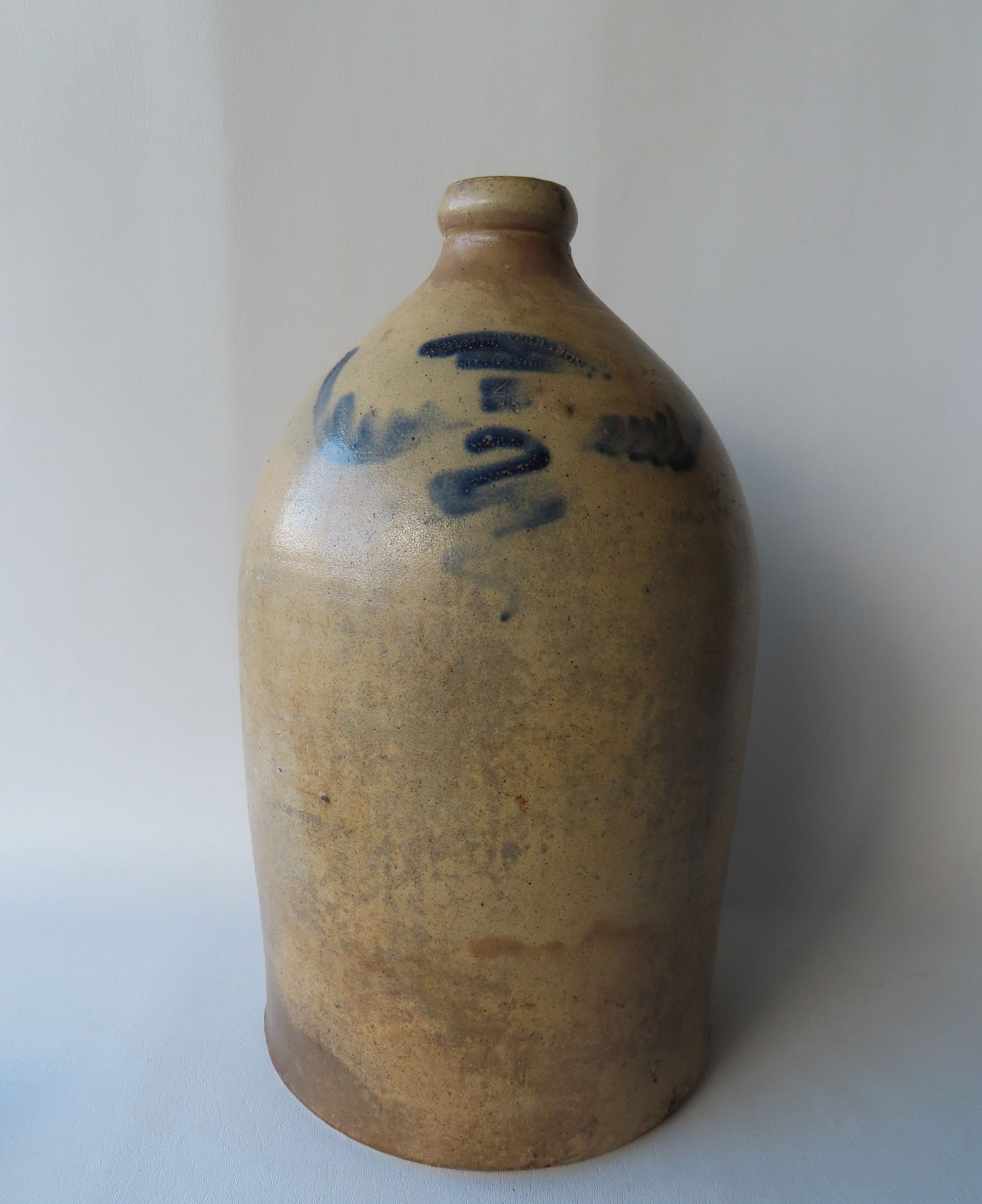 A stoneware 4 gallon jug marked "M.C. Webster & Sons / Hartford CT.", decorated with a cobalt blue (1 of 8)