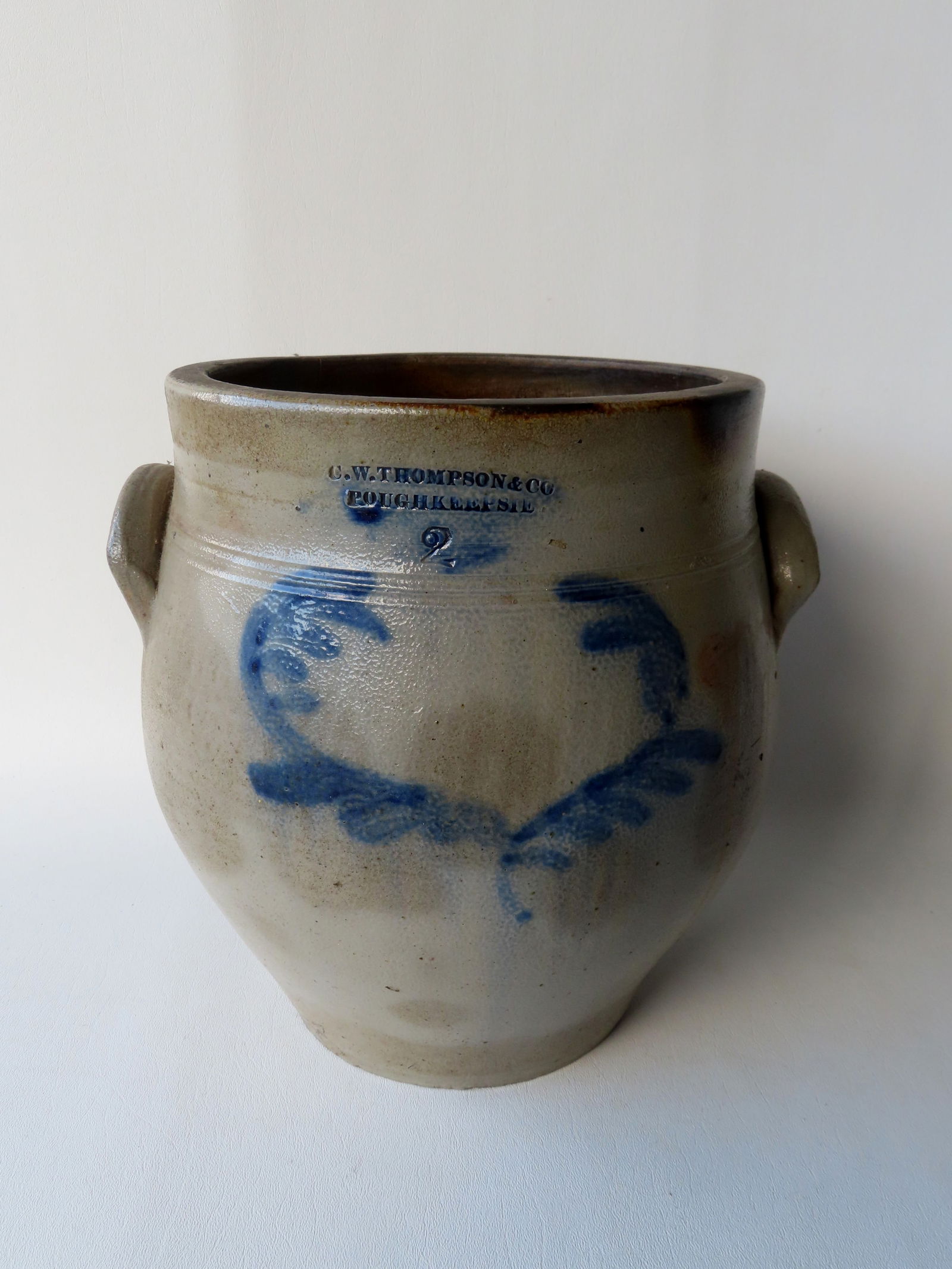 Stoneware ovoid crock, marked "C.W. Thompson & Co. / Poughkeepsie", 2 gallon, with applied ears, (1 of 9)