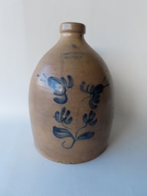 Stoneware jug marked "Riedinger & Caire / Poughkeepsie NY", decorated with a cobalt blue double