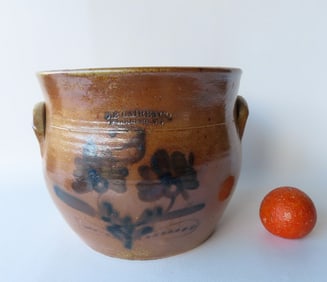 Stoneware ovoid crock marked "J.B. Caire & Co. PoKeepsie N.Y.", decorated with a large cobalt blue