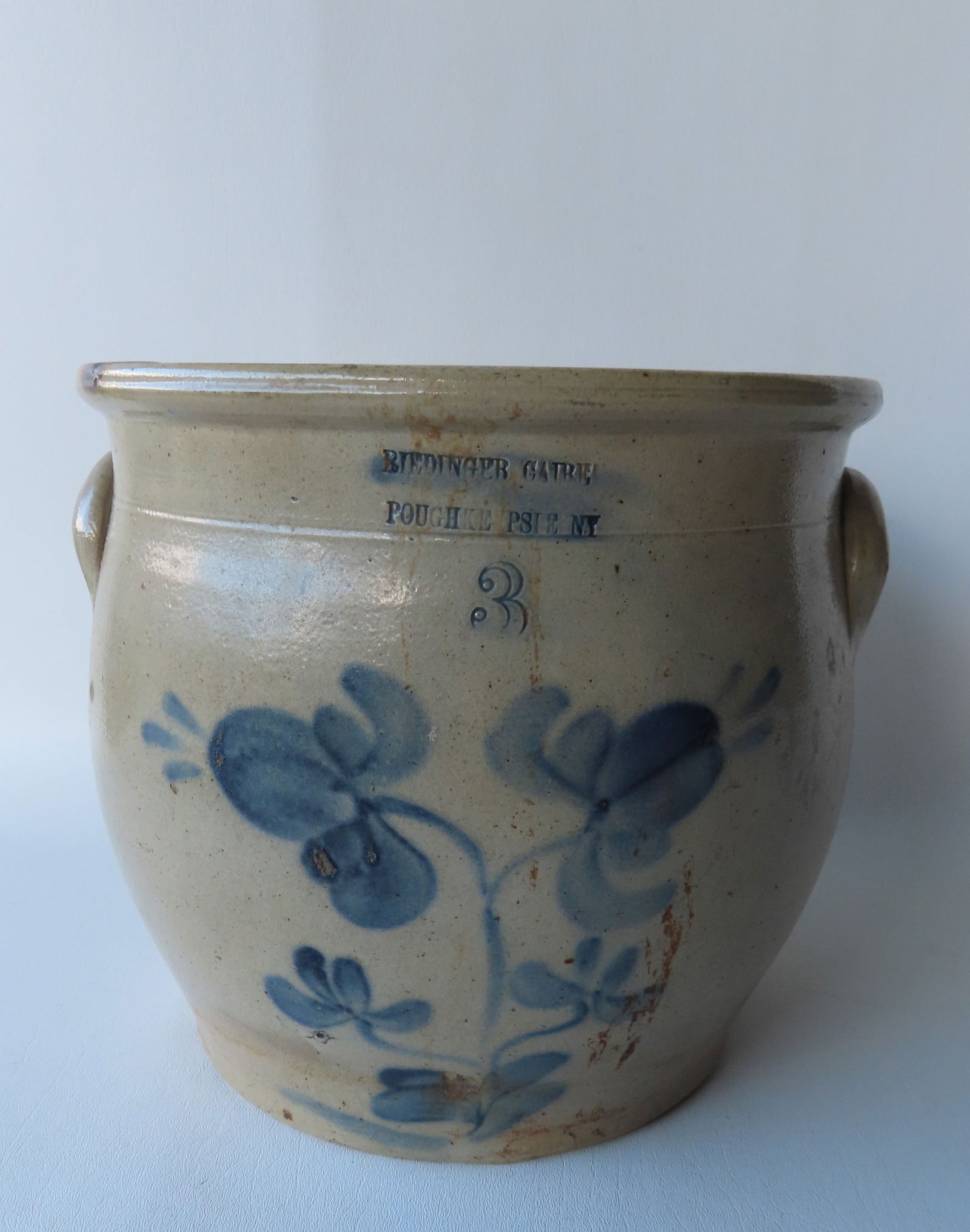 Stoneware ovoid crock marked "Riedinger Caire / Poughkeepsie NY" and decorated with 4 flowers (1 of 7)