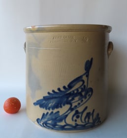 A large stoneware crock marked "Adam Caire / PoKeepsie. N.Y." with a bold cobalt blue decoration of