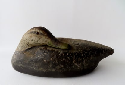 Robert "Bob" White, Pa. b. 1939. A preening black duck decoy with a carved wooden head in original