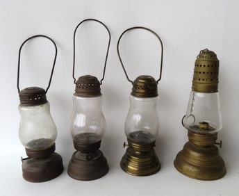 A grouping of 4 skating lanterns, late 19th century, all in good condition. The largest 8 3/4"H. One