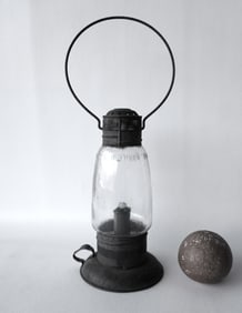 G. W. Woodwards tin candle lantern, with pierced vents, original colorless globe marked "Woodwards
