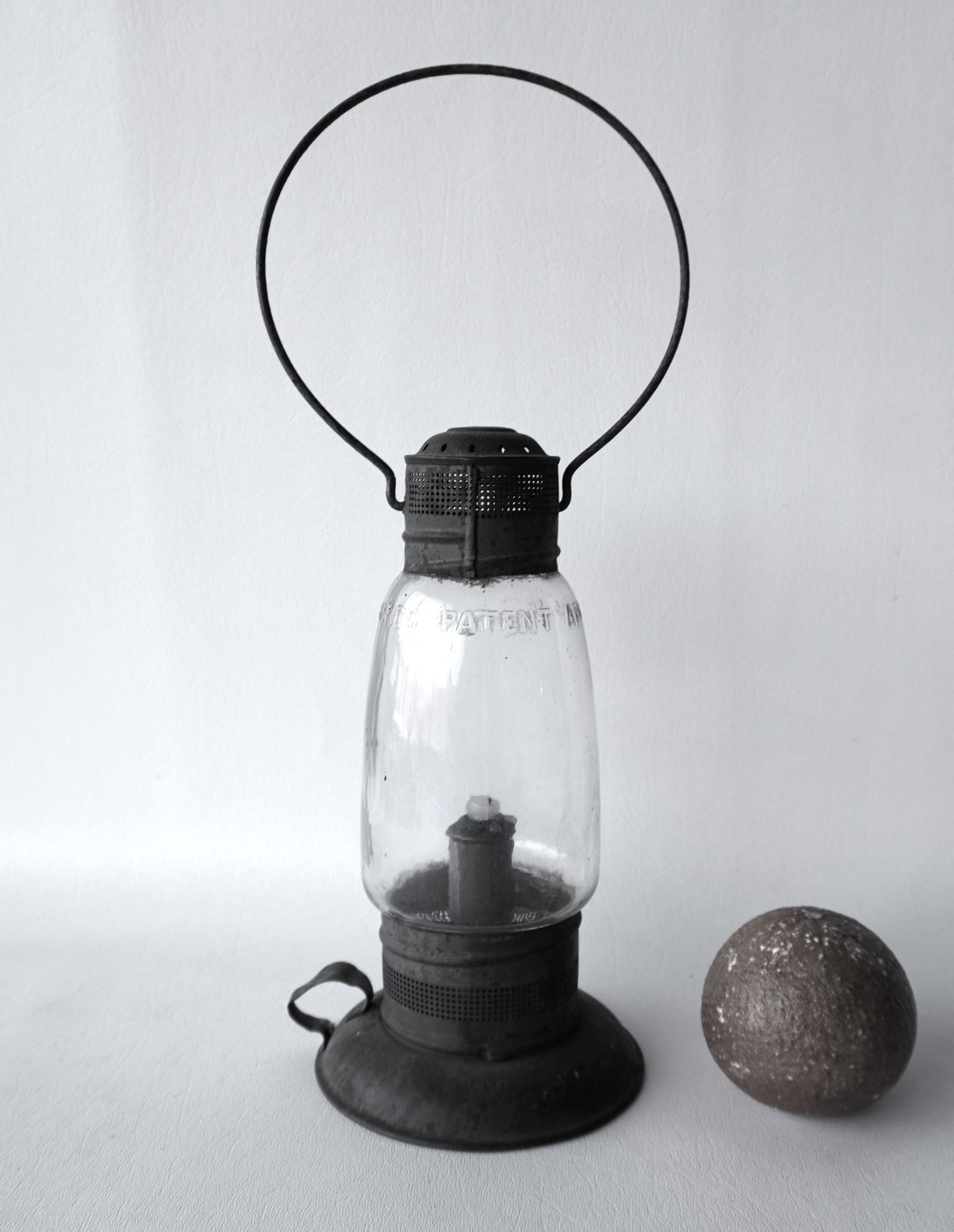 G. W. Woodwards tin candle lantern, with pierced vents, original colorless globe marked "Woodwards (1 of 13)