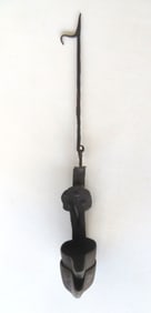 A hand forged iron double Betty Lamp, very good condition, 18th century. Smallest size 7 1/2"H and