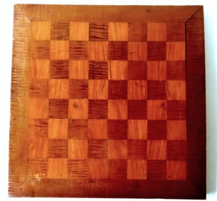 A tiger maple game board, late 19th century. Slight bow in board, else very good condition. Measures