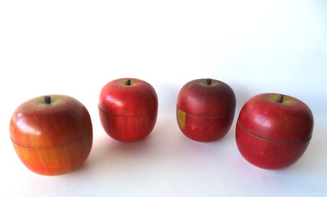 Grouping of 4 hand painted wooden oversized apples with race horse game on interior, early to mid