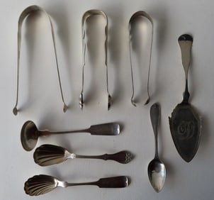 Grouping of 8 coin silver serving pieces, 7 from Poughkeepsie NY,  including 3 sugar tongs, 1 cake