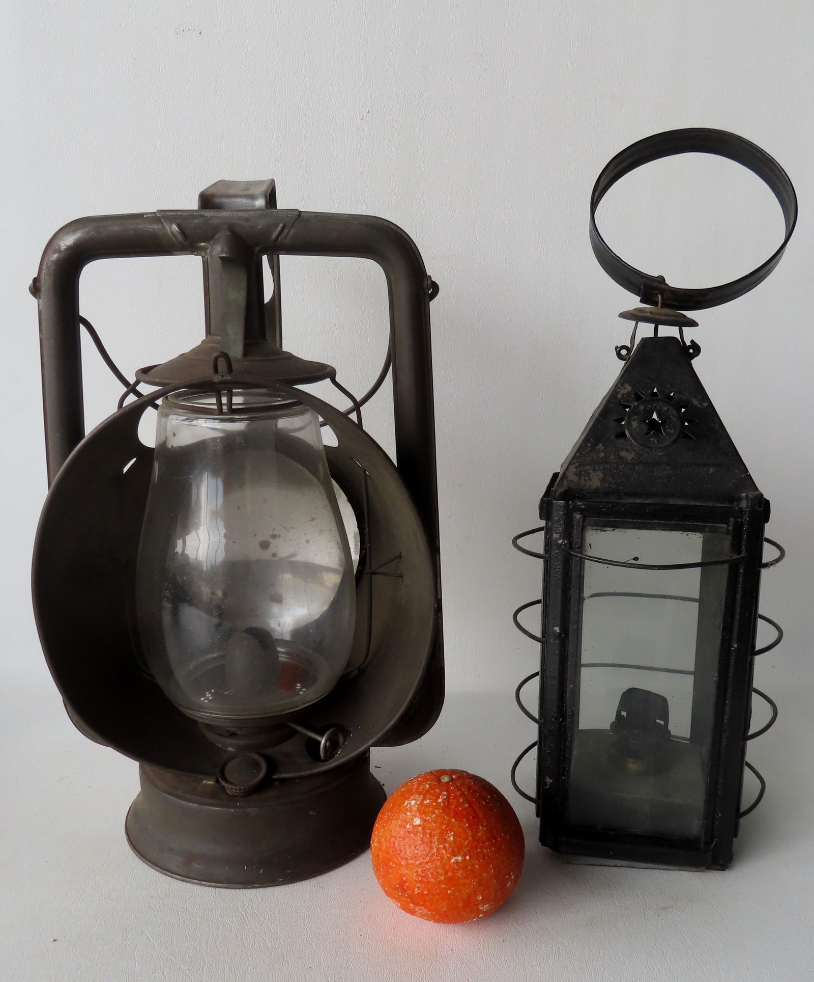 Two early oil lanterns with original lamps,, including: The first with a pierced star with sunray (1 of 10)